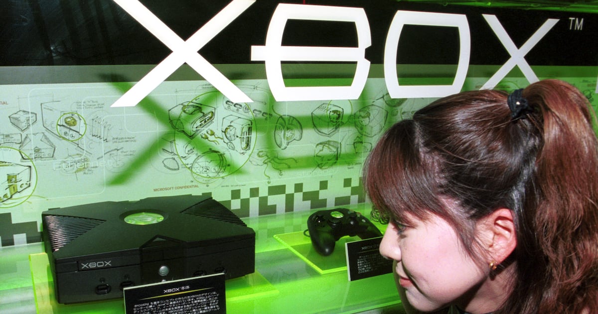 Photo: Thenationalnews The original Xbox on display before its 2001 launch, when Microsoft entered the console market. Getty Images