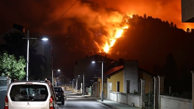 A forest fire burns in Vilamartin de Valdeorras, Galicia, Spain. EPA