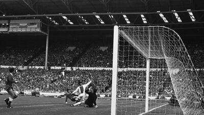 Ajax's Johan Cruyff scores in the 1971 European Cup final against Panathinaikos at Wembley. Cruyff and Ajax would complete a treble the following season. AP Photo / June 2, 1971