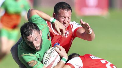Eagles' George Agius is tackled by Tigers Aaron Persic. All pictures Chris Whiteoak / The National