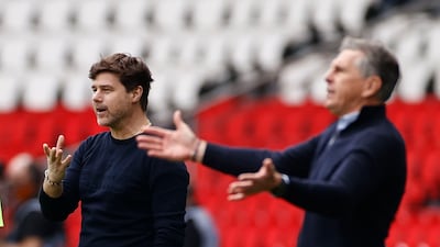 Saint Etienne manager Claude Puel, right, and his PSG counterpart Mauricio Pochettino. Reuters