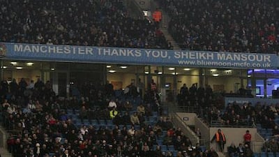 A banner at the City of Manchester Stadium shows the supporters' appreciation for the work on and off the field being undertaken by the club's Abu Dhabi owners.