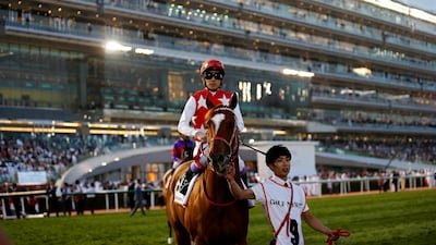 epa07473175 Jockey Yutaka Take of Japan on Matera Sky prepares to compete in the Dubai Golden Shaheen race during the Dubai World Cup 2019 at the Meydan race course in the Gulf emirate of Dubai, United Arab Emirates, 30 March 2019. The Dubai World Cup is one of the highest endowed events in the horse racing calendar. EPA/ALI HAIDER
