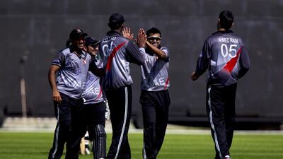 For years, expatriates such as Khurram Khan, centre, and Ahmed Raza, right, have been mainstays of the UAE cricket team. Although Raza was born here, neither are Emirati. Christopher Pike / The National