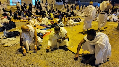 Pilgrims collect pebbles. EPA