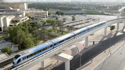 A train sets off from the Healthcare City metro station towards Etisalat station during the inaguration of the Green Line on Friday.