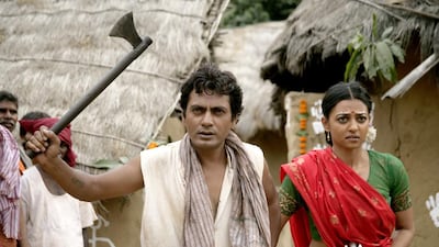 Nawazuddin Siddiqui as Dashrath Manjhi and Radhika Apte as his wife in Manjhi - The Mountain Man. Courtesy Viacom18 Motion Pictures