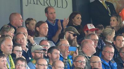 Prince George and Prince William are seen in the stands during the Premier League match between Norwich City and Aston Villa. Getty Images