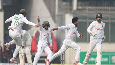 Bangladesh's Mehidy Hasan Miraz celebrates wicket of India's Axar Patel. AP