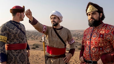 Competitors prepare for the first event of the day, the long-distance shooting competition