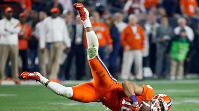Jordan Leggett #16 of the Clemson Tigers falls to the ground after making a catch against the Alabama Crimson Tide during the 2016 College Football Playoff National Championship Game at University of Phoenix Stadium on January 11, 2016 in Glendale, Arizona. Sean M. Haffey/Getty Images/AFP