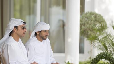 Sheikh Hazza bin Zayed, National Security Advisor and Vice Chairman of the Abu Dhabi Executive Council, left, with Sheikh Hamdan, Crown Prince of Dubai, at the lunch meeting. Mohamed Al Hammadi / Crown Prince Court - Abu Dhabi