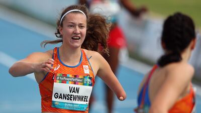 Marlene van Gansewinkel (L) and Kimberly Alkemade (R) of Netherlands react after the Women's 200m T64 final at the World Para Athletics Championships in Dubai, United Arab Emirates. EPA