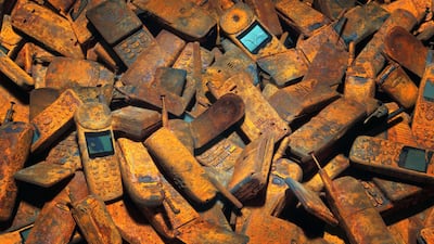 Discarded mobile phones can leak toxic chemicals into the ground. Getty