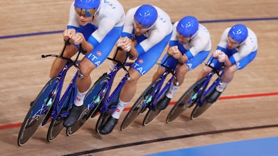 Simone Consonni, Filippo Ganna, Francesco Lamon and Jonathan Milan of Team Italy sprint to set a new world record during the Men's team pursuit finals, winning the gold medal in the process.