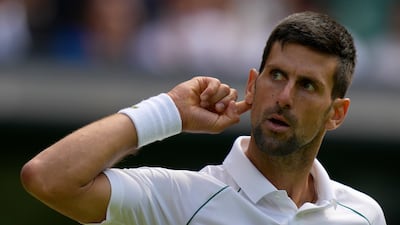 Novak Djokovic signals to the crowd during his match against Jannik Sinner. AP