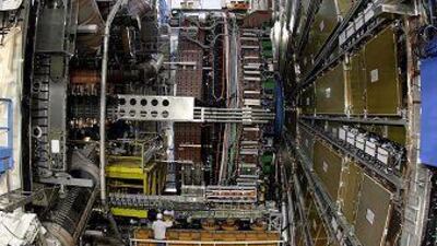 What could possibly go wrong? Technicians conduct one of the many inspections of the Large Hadron Collider beneath the border of Switzerland and France.