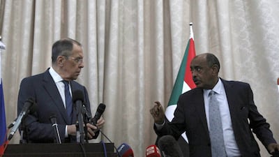 Russian Foreign Minister Sergey Lavrov, left, and Sudanese acting foreign minister Ali Al Sadeq in Khartoum, Sudan, on February 9. AP