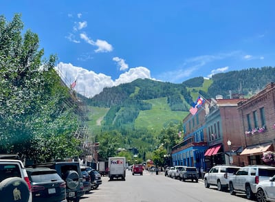 Green ski slopes and blue skies in July 2024 in Aspen, Colorado. Thomas Watkins / The National