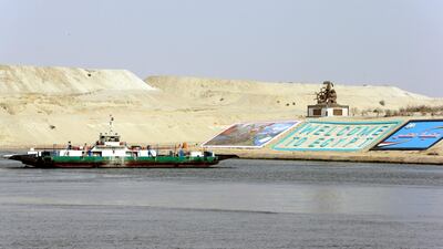 Egyptians use the ferry to cross the Suez Canal in Ismailia, 120 kilometres east of Cairo, on February 9, 2018. Khaled Elfiqi / EPA