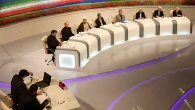 Presidential candidates from right, Mohammad Gharazi, Mohammad Reza Aref, Saeed Jalili, Ali Akbar Velayati, Gholam Ali Haddad Adel, Hasan Rowhani, Mohammad Bagher Qalibaf and Mohsen Rezaei, square off in a debate last week in Tehran. Islamic Republic of Iran Broadcasting, Mehdi Dehghan / AP Photo