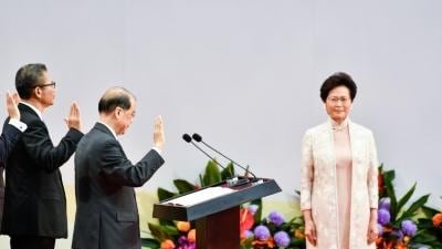 Carrie Lam, right, was sworn in as Hong Kong's new Chief Executive with her new cabinet during an inauguration ceremony in Hong Kong, China on July 1, 2017. Keith Tsuji/Getty Images