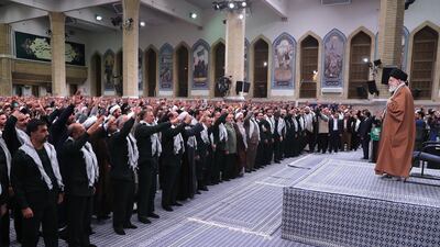 Iranian Supreme Leader Ayatollah Ali Khamenei with members of Basij voluntary security forces in Tehran. Leader office handout / EPA