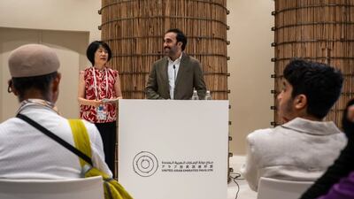 Manhat, a UAE start-up dedicated to sustainable water and floating farms founded by Saeed Alhassan, centre, has been honoured at Expo 2025 in Osaka, Japan, receiving the Best Practices Award. Photo: Manhat