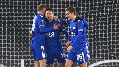 Leicester City's Cengiz Under celebrates with teammates after scoring. PA