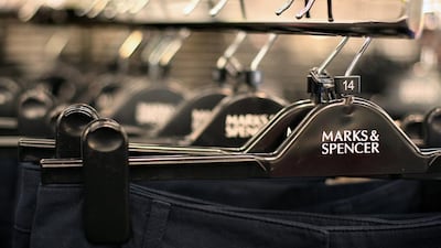 Clothes are pictured inside a Marks and Spencers retail store in London. The retailer has started stocking burkinis – and some people aren't happy, writes Shelina Janmohamed (AFP PHOTO/SHAUN CURRY)