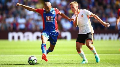 Andros Townsend of Palace battles with Antonio Lato of Valencia. (Photo by Christopher Lee/Getty Images)