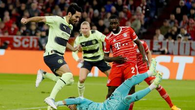 Yann Sommer of Bayern Munich saves at the feet of Ilkay Gundogan of Manchester City. EPA