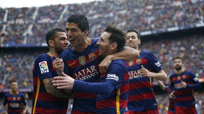 FC Barcelona’s Lionel Messi, third right, celebrates after scoring with his teammate Luis Suarez, second left, during a La Liga match between FC Barcelona and Espanyol at the Camp Nou stadium in Barcelona, Spain, Sunday, May 8, 2016. (Manu Fernandez/AP Photo)