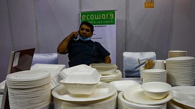Plates, bowls and containers made from sugarcane fibre displayed at an 'alternative to plastic' fair in New Delhi. AFP