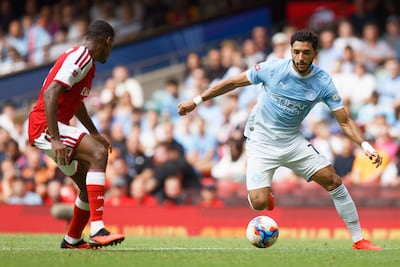 Omar Marmoush of Manchester City (R) in action during the FA Community Shield match Arsenal FC against Manchester City, in Cardiff, Wales, 16 August 2026. EPA / DIMITRIS LEGAKIS