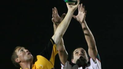 Reaching out for success. Players from Dubai Hurricanes, left, and Abu Dhabi right, fight for the ball during a clash last season. Both sides are hoping for a strong campaign in the new campaign.