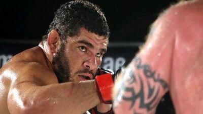 October 22, 2010/ Abu Dhabi / Marcos Oliveira, left, fights Neil Wain during the final bout of Abu Dhabi Fight Championship's Round 2 in Abu Dhabi October 22, 2010. Oliveira won the fight by decision. (Sammy Dallal / The National)