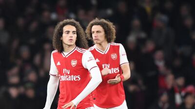 Arsenal's David Luiz (L) and Matteo Guendouzi during the FA Cup win over Leeds. EPA