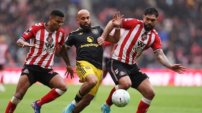 Bryan Mbeumo vies for the ball with Reinildo Mandava and Omar Alderete of Sunderland. Getty Images