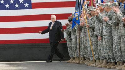 Vice president Cheney takes to the stage in 2008 to boost the morale of US troops stationed at Balad Airbase, Iraq. AFP