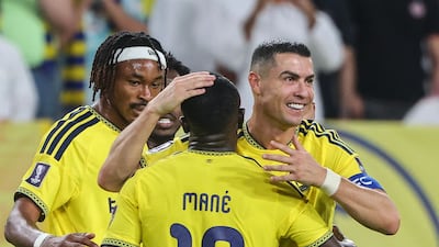 Cristiano Ronaldo celebrates with Al Nassr teammates after scoring against Neftchi. AFP