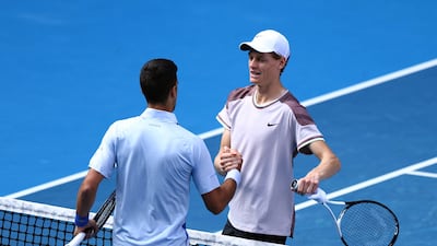 The two players embrace at the end of the match. Reuters