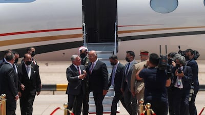 Iraqi President Barham Salih receives Jordanian King Abdullah II at Baghdad Airport. AFP