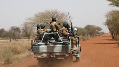 Soldiers patrol the road of Gorgadji, Burkina Faso, in the Sahel region in 2019. Reuters