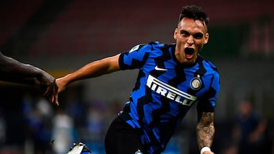 Inter Milan's Argentinian forward Lautaro Martinez celebrates after scoring. AFP