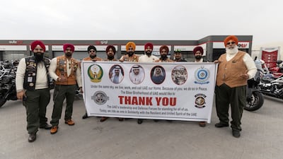 At the Biker Buddies Eid Brotherhood Ride 2026 more than 300 motorcyclists from 40 countries including the UAE meet on the second day of Eid. The ride covered 280km from Dubai to the Kalba Corniche. Singh's UAE MC members brought a special banner thanking the UAE. Antonie Robertson/The National