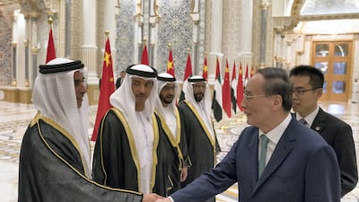 Wang Qishan, Vice President of China (right) greets Lt General Sheikh Saif bin Zayed, UAE Deputy Prime Minister and Minister of Interior during a reception at the Presidential Palace on October 28, 2018. Hamad Al Kaabi / Crown Prince Court - Abu Dhabi