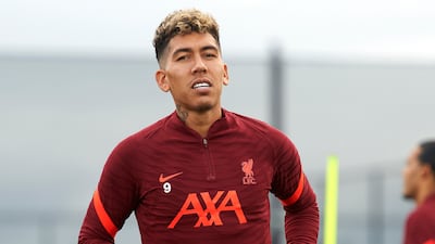 Roberto Firmino of Liverpool during a training session at AXA Training Centre in Kirkby, England. All photos by Getty Images