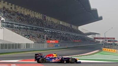 Mark Webber of Australia drives into the pit lane during the second practice session ahead of the Indian F1 Grand Prix at the Buddh circuit, near New Delhi on Friday.