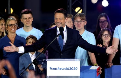 Mayor of Warsaw and presidential candidate Rafal Trzaskowski addresses his supporters following the announcement of the presidential election's exit poll results in Warsaw, Poland, July 12, 2020. REUTERS
